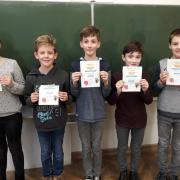„Top 5-Leser“ der Klasse 5b: Emma Arenth, Felix Lischer, Moritz Allmoslöchner, Benedikt Reinhard und Jan Schallmeier (von links nach rechts).